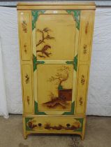 Chinoiserie style painted single door wardrobe with drawer below, yellow/gold ground with painted