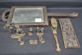 Quantity of tribal items to include: five bronze figures, horn figure, carved panel and carved