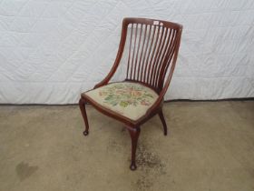 Inlaid mahogany bedroom chair with vertical back rails, tapestry seat and standing on cabriole