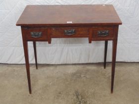 Mahogany ladies writing table with three drawers and standing on four tapering legs - 33" x 19" x
