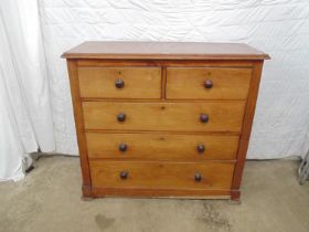 Victorian mahogany chest of two short and three long drawers with knob handles, standing on plinth
