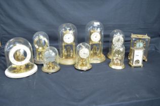 Group of seven dome cased Anniversary clocks together with three other clocks Please note