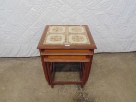 Mid century nest of three G-Plan tables the top having tile top - largest 20" x 20" x 21.5" tall