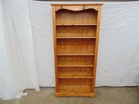Open fronted pine bookcase with four adjustable and one fixed shelf - 34" x 72" tall Please note