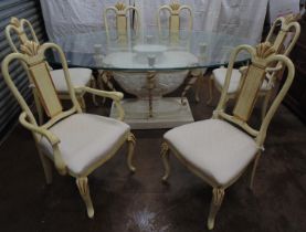 Oval glass top dining table - 76.5" x 43.25" together with six cream and gilt painted chairs
