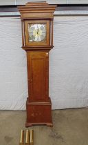 David Bryant Urgos oak cased grandfather clock with brassed and silvered dial having black Roman
