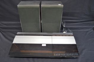 Bang & Olufsen Beocenter 4000 and a pair of Bang & Olufsen Beovox X25 speakers (untested) Please