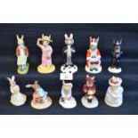 Group of nine Royal Doulton Bunnykins figures to comprise: Gardener Bunnykins, Bridesmaid Bunnykins,