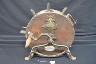 Kent's knife cleaner on iron frame - 19.5" tall Please note descriptions are not condition