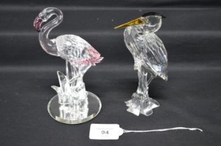 Swarovski figure of a Heron designed by Adi Stocker and retired in 2005 together with a figure of