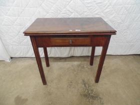 Georgian mahogany fold over tea table with single drawer to frieze, standing on square legs - 30"