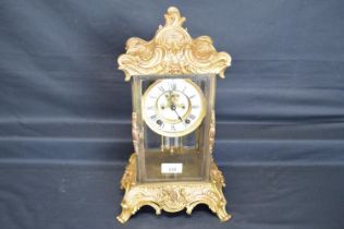 Gilt metal four panel glass mantel clock - 15" tall Please note descriptions are not condition