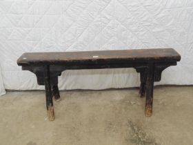 Hardwood rustic bench standing on stretchered legs and painted black (worn) Please note descriptions