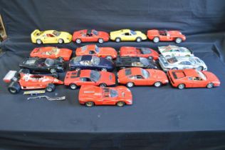 Group of twenty two unboxed and one boxed 1:18 scale model cars Please note descriptions are not