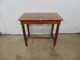 Pine side table with single drawer to frieze with knob handle, standing on turned stretchered base -