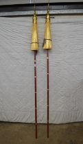 Pair of long handled gilt parasols - aprox 87.5" long Please note descriptions are not condition