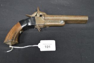 Un-named twin barrel box lock pistol with wooden hand grip Please note descriptions are not
