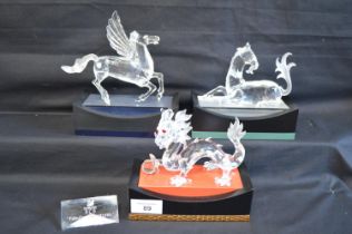 Set of three Swarovski Collectors Society Annual Figures and title plaque - Fabulous Creatures to