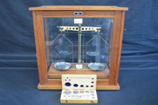 Eureka Scientific Co. Ltd cased balance scales and a boxed part set of weights - 18" wide Please