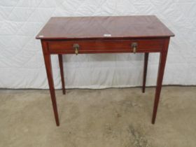 19th century mahogany side table having single long drawer with drop handles, standing on tapering