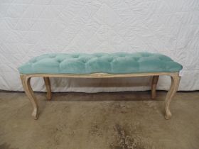 Long pale blue buttoned upholstery stool standing on limed oak square cabriole legs - 45" x 16" x