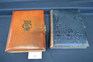 Two Victorian photograph albums with metal clasp catches Please note descriptions are not