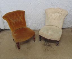 Pair of Victorian button back nursing chairs on turned legs ending in castors Please note