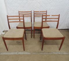 Set of four G-Plan chairs with neutral upholstered seats and three slat backs Please note