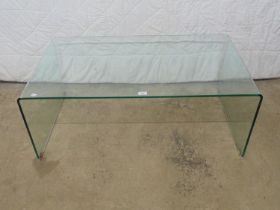 Modern shaped glass coffee table - 43.5" x 23.75" x 17.25" tall Please note descriptions are not