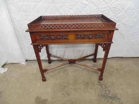 Late 19th century carved mahogany side table with pierced gallery and single drawer, standing on