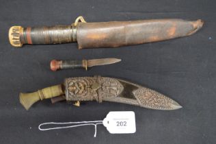 Presentation Queens Gurkha Kukri and scabbard with two skinning knives having white metal mounts -
