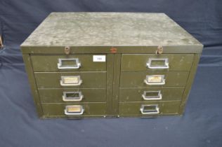 Green painted bank of eight metal filing drawers by Owen & Randall - 22.5" x 12" tall Please note