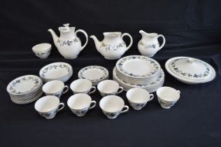 Royal Doulton Burgandy teaset to comprise: eight tea cups, nine saucers, two teapot (one lid