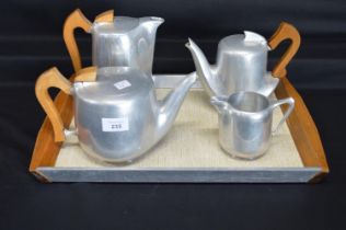 Picquotware five piece teaset to comprise: teapot, hot water pot, coffee pot, milk jug and tray
