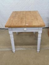 Painted and natural pine kitchen table having single drawer with knob handle, standing on turned