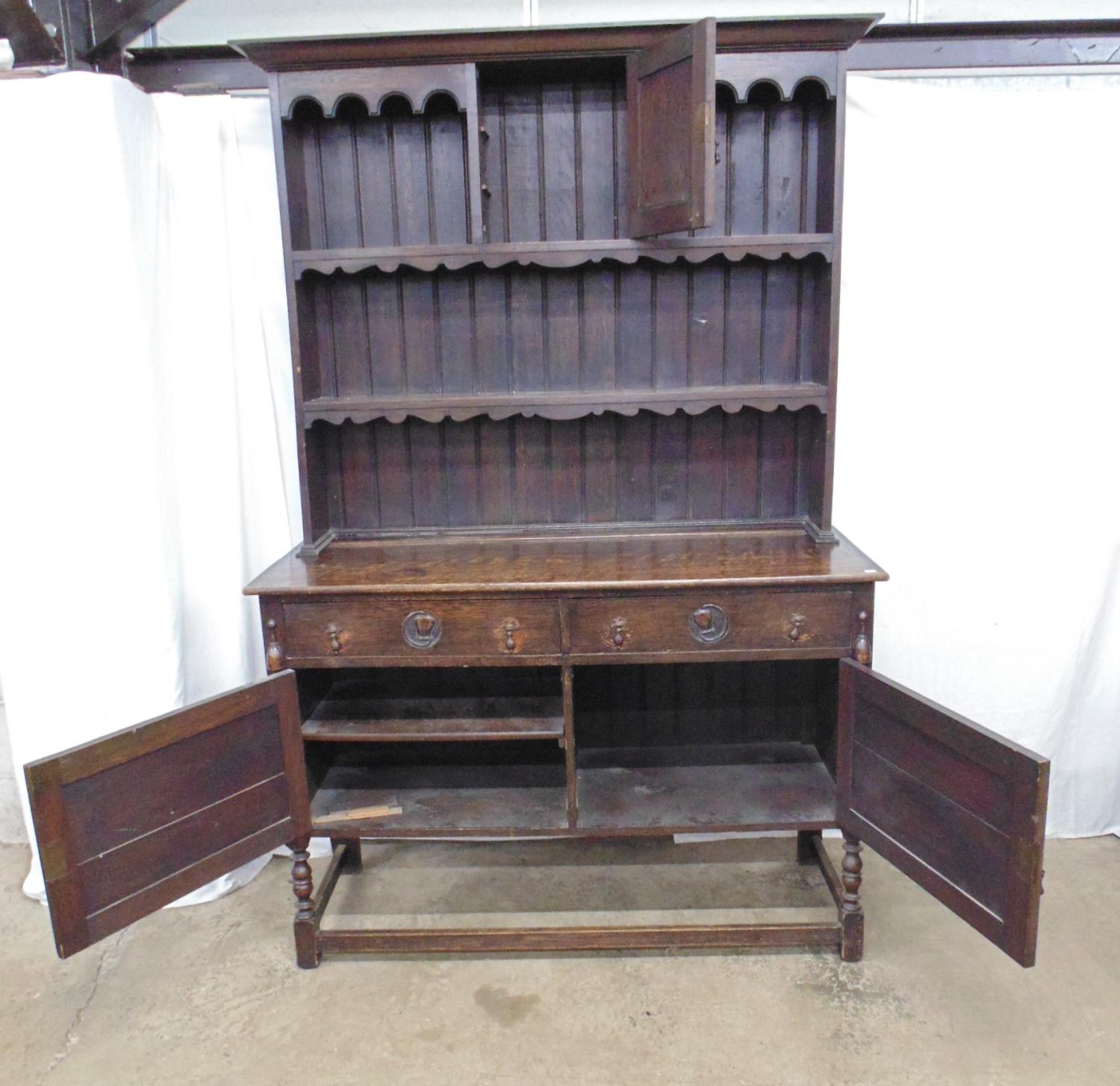 Oak dresser with shelved upper section and two short drawers over two cupboard doors to base, - Image 2 of 2