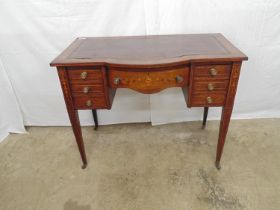Inlaid mahogany ladies desk with gilt tooled leather insert over two bands of three drawers and