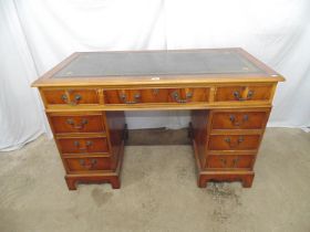 Reproduction yew wood twin pedestal writing desk with green leather gilt tooled writing insert