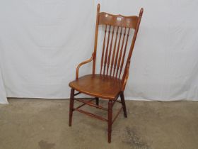 Oak American bentwood spindle back chair with turned finials, bow fronted seat, standing on turned