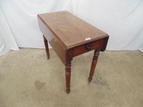 Victorian mahogany Pembroke table with single drawer and knob handle, standing on turned legs ending