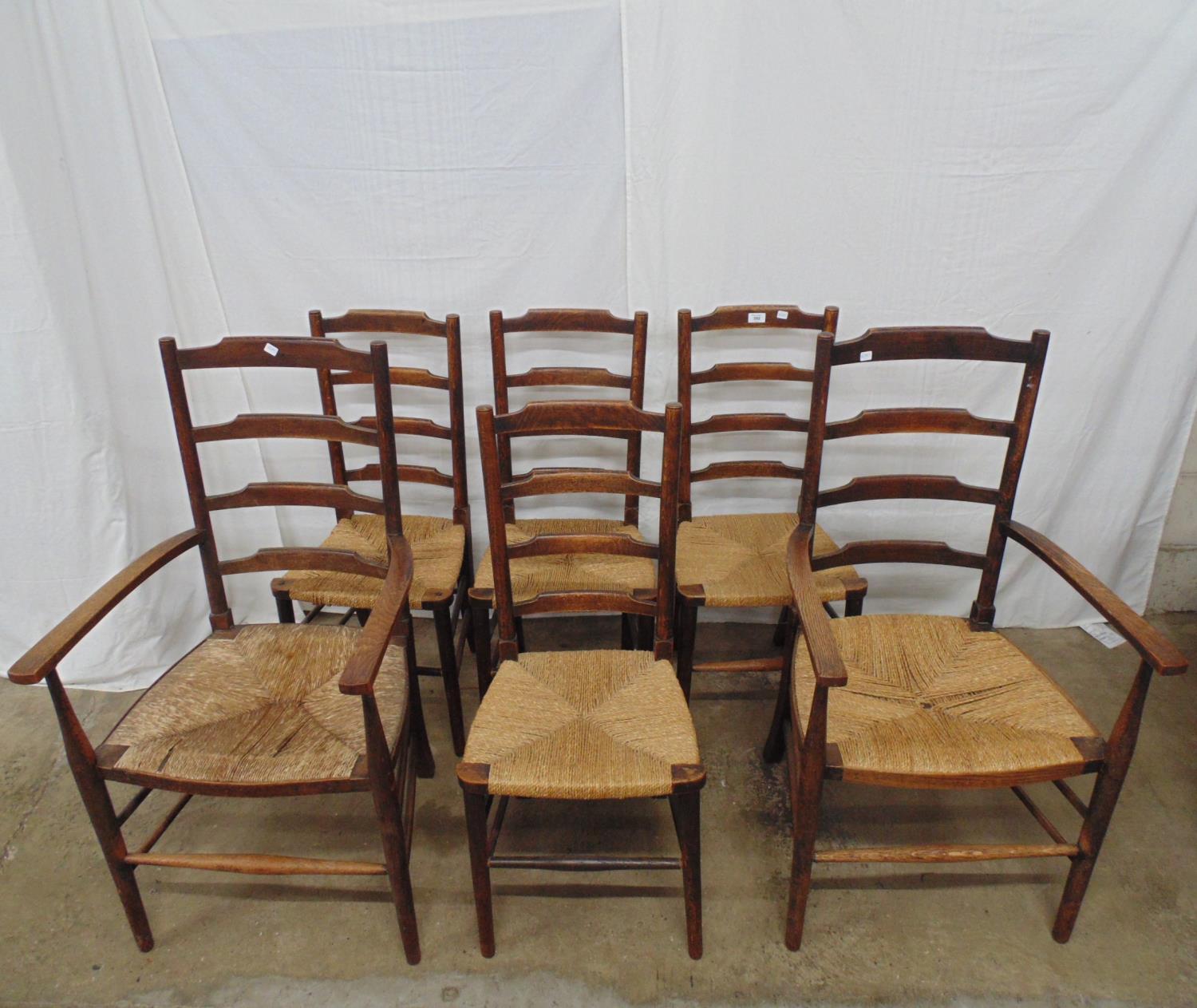 Set of six oak rush seated ladderback country chairs to comprise four chairs and two carvers - Image 2 of 2