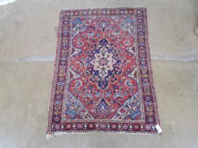 Red ground pink, blue, green, cream and black patterned rug - 1.5m x 1.08m (tassels af so not