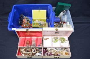 Two boxes containing a quantity of costume jewellery Please note descriptions are not condition