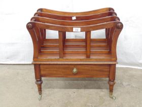 Mahogany Canterbury having three sections over single drawer, standing on turned legs ending in