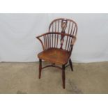 19t century yew wood and elm Windsor chair with stick back and pierced back splat, standing on