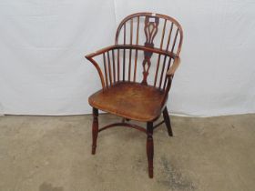19t century yew wood and elm Windsor chair with stick back and pierced back splat, standing on