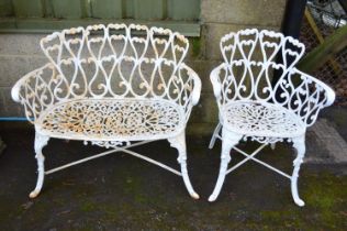 Cast iron two seater garden bench - 36.75" wide together with a matching elbow chair. Please note
