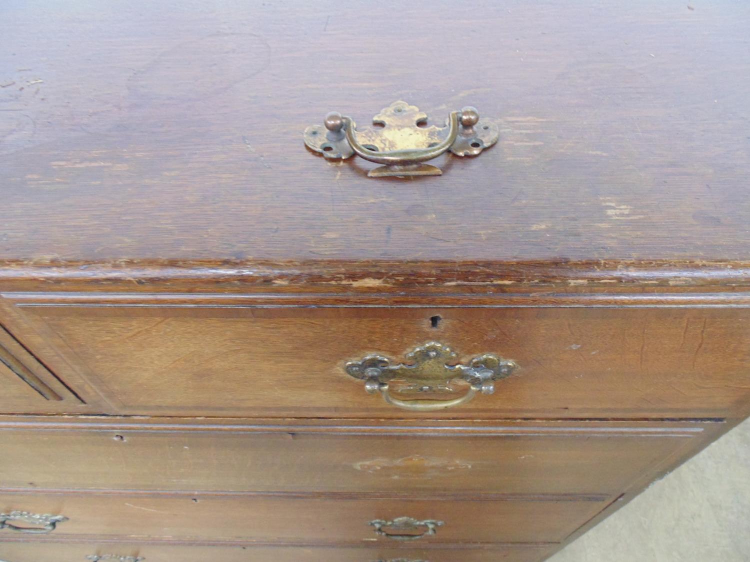 Warings oak chest of two short and three long crossbanded drawers with brass handles, standing on - Image 4 of 5