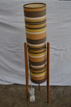 Mid century rocket floor lamp having material covered card shade - 49.25" tall Please note