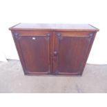 Victorian mahogany two door cupboard having knob handle and opening to reveal two shelves - 36.5"